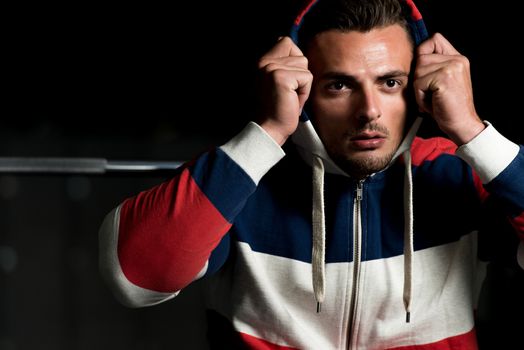 Portrait Of A Young Muscular Sporty Fit Caucasian Man Resting At The Bench