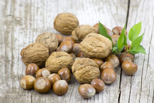 nuts on old wooden background