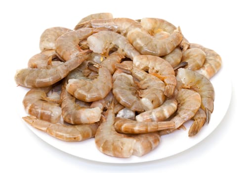 Raw headless prawns on white background