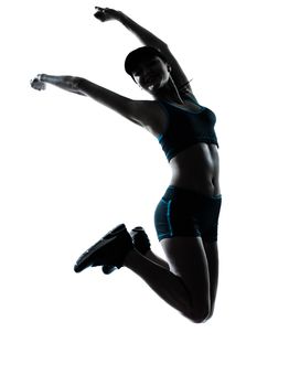 one caucasian woman runner jogger jumping happy jumping in silhouette studio isolated on white background