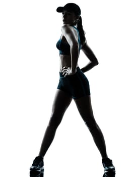 one caucasian woman runner jogger stretching in silhouette studio isolated on white background