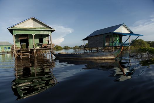 Wooden stilt houses in Kampong Phluk village in Siem Reap province Cambodia