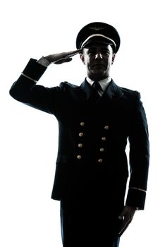 one caucasian man in airline pilot uniform saluting silhouette in studio isolated on white background