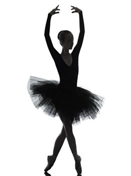 one caucasian young woman ballerina ballet dancer dancing with tutu in silhouette studio on white background