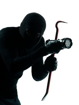 thief criminal burglar portrait masked in silhouette studio isolated on white background