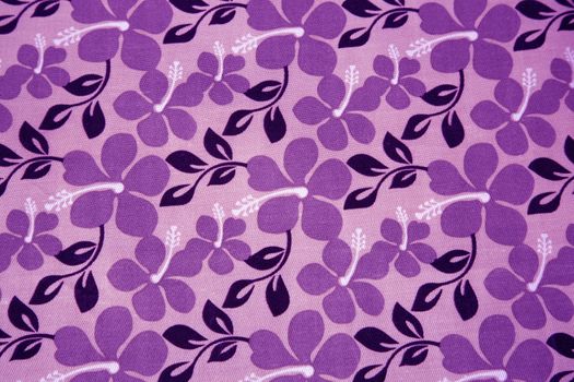 Violet flowers on textil background