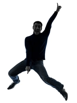 one caucasian man full length in silhouette studio isolated on white background