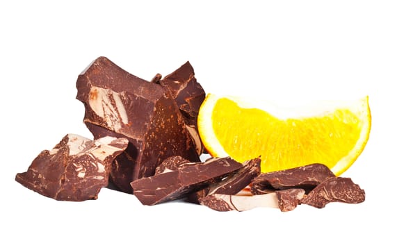 Heap of delicious black chocolate with orange lobule