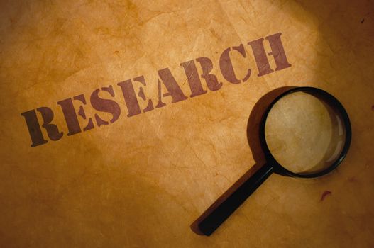 Magnifying glass next to research title 