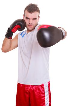 Stretched Young handsome boxer in shirt and boxing gloves with left arm against the camera