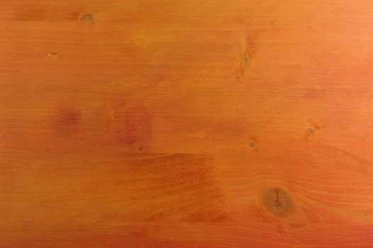Wooden background painted in orange