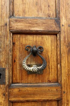 The door knocker  and handle on an medieval door