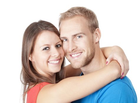 portrait of a happy young couple smiling, looking - isolated on white