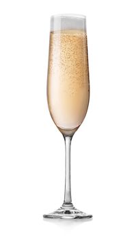 Champagne with bubbles in a glass isolated on white