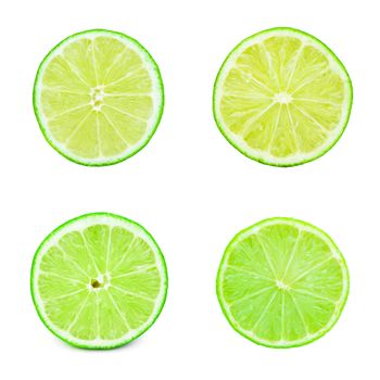 Collection of fresh green limes isolated on white background