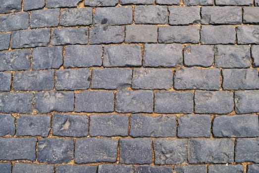 Fragment of old rough block pavement surface, Red Square in Moscow, Russia