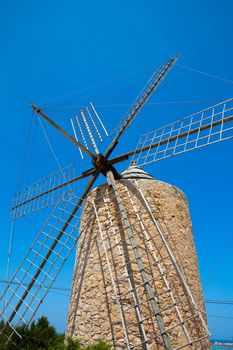 Formentera Windmill wind mill vintage masonry and wood in Mediterranean Balearic islands