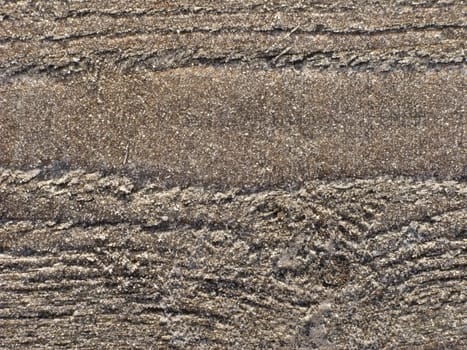 Texture of dark wooden surface with hoarfrost