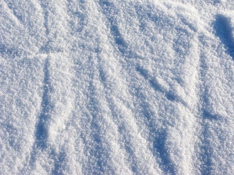 Texture of fresh snow surface on sunny day