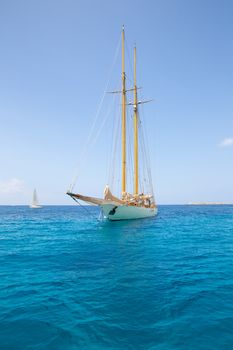 Illetes Illetas Formentera yacht sailboat anchored in turquise Mediterranean