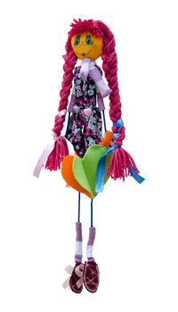 The handmade doll toy isolated thin cheerful girl in  striped dress with bag