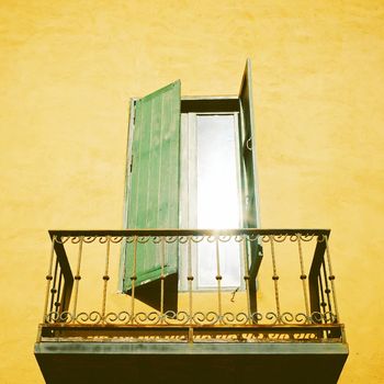 Vintage metal terrace and window with retro filter effect