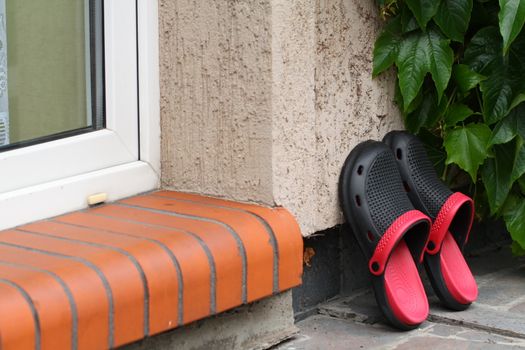 plastic slippers based on wall
