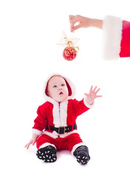Little Santa boy wants to play isolated on white background
