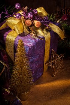 Presents over wooden background for Merry Christmas and Happy New Year