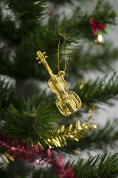 close up violin on christmas tree