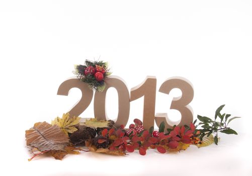 Year in numbers with autumn leaves and other product for New Year