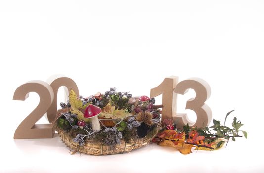 Year in numbers with autumn leaves and other product for New Year