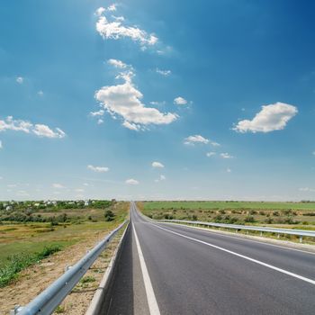 asphalt road and blue sky