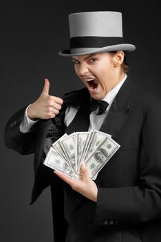 Gangster girl keeps money in hands and showing OK sign