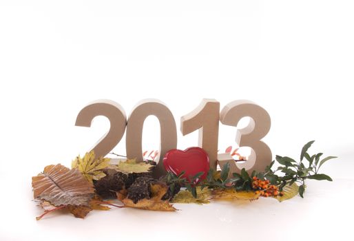 Year in numbers with autumn leaves and other product for New Year