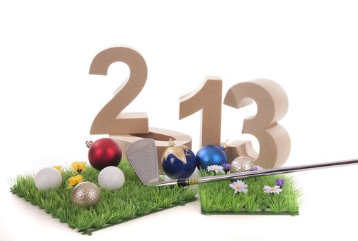 Golfstick and green symbolizes golfsport in the New year