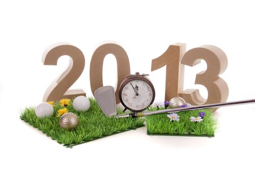 Golfstick and green symbolizes golfsport in the New year