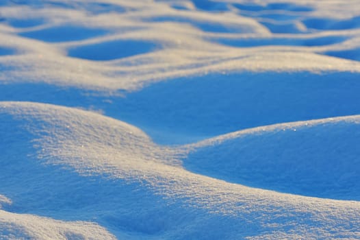 macro waves of snow bumps, shoot at sunrise