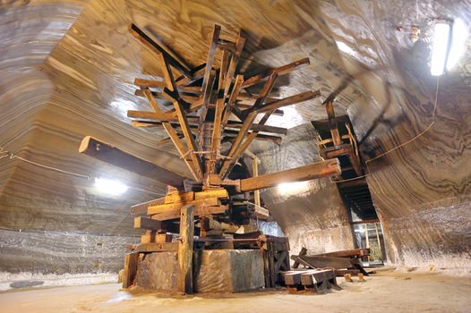 old  extraction salt machine inside of salt mine