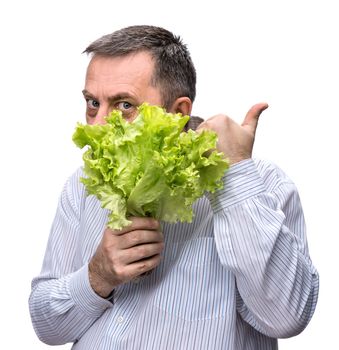 Organic food. Man holding lettuce isolated on white