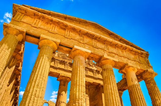 Ruins of ancient temple front pillars in Agrigento, Sicily, Italy