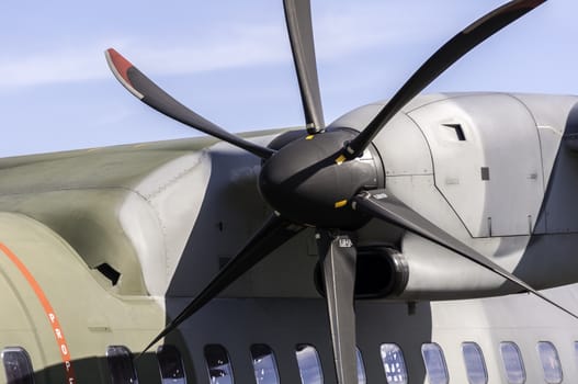 Close up view of a military transport airplane engine.