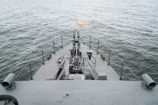 an old cold war type of torpedo boat on the sea