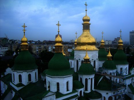 Green and golden domes of St. Sophia's Cathedral in Kiev, Ukraine