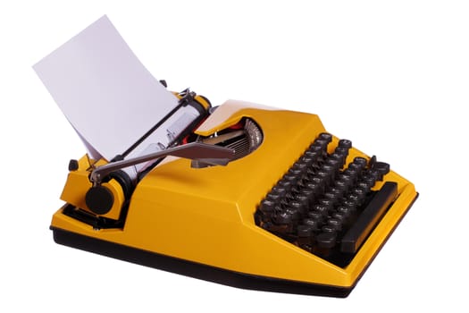 old yellow typewriter with paper