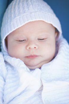 Little baby boy with blue eyes  portrait