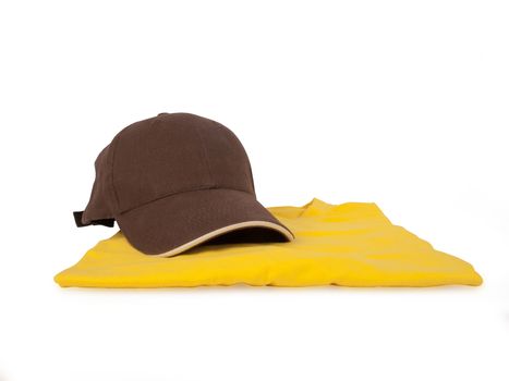 brown baseball cap and yellow t shirt