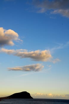 Cloudscape, Colored Clouds at Sunset near the Ocean