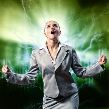 furious woman is straining arms and looking up, concept violent person