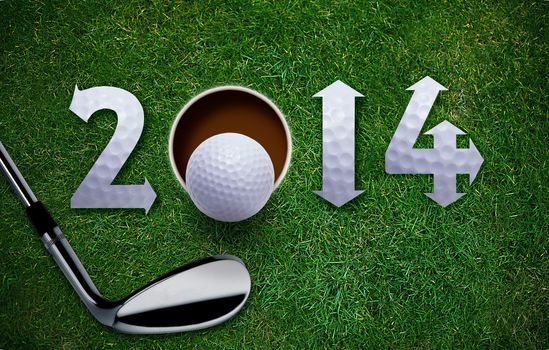 Happy New Golf year 2014, Golf ball and putter on green grass, the same concept available for 2015, 2016 and 2017 year.